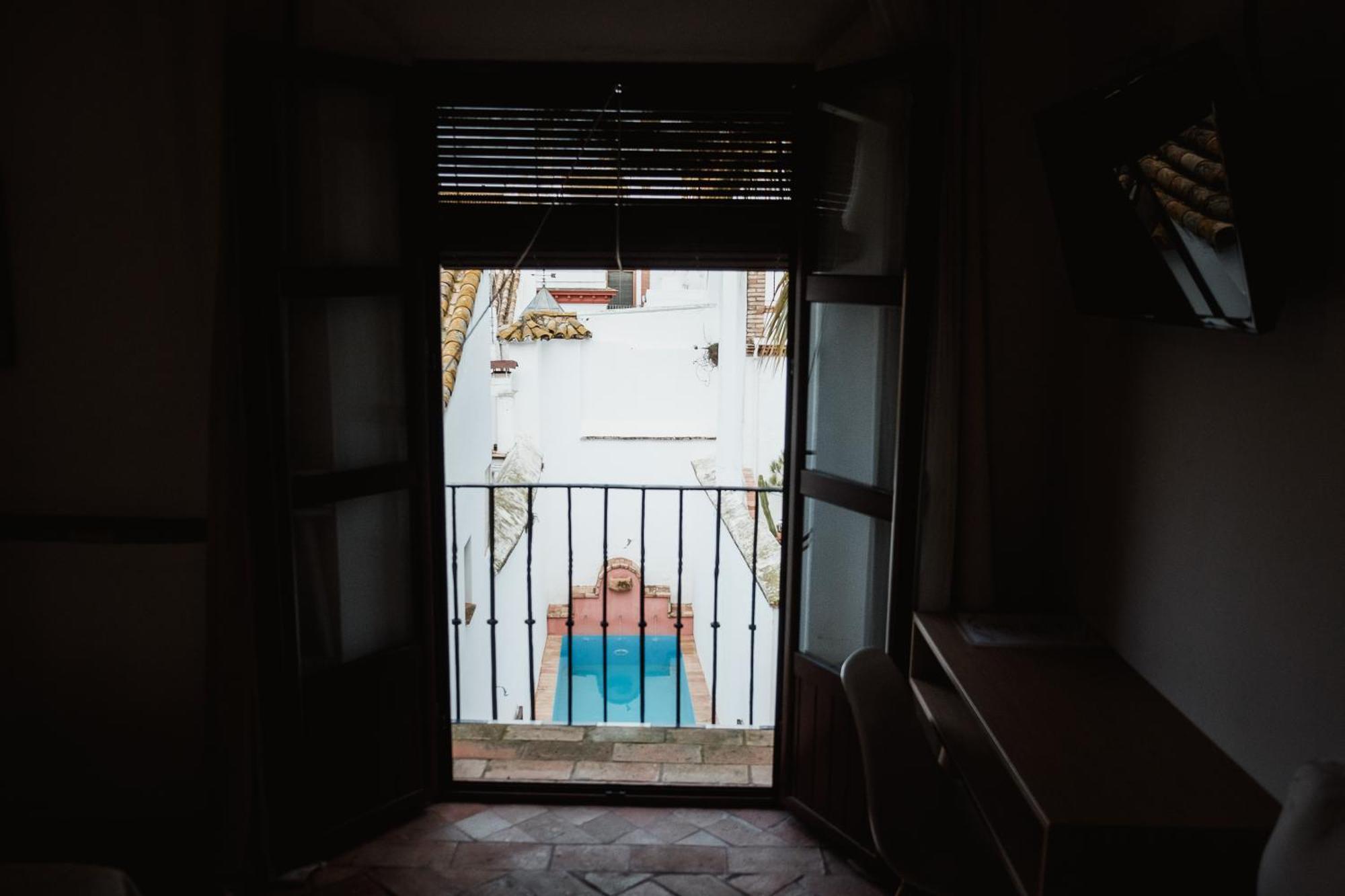 Hostal Cafe Frenteabastos Кармона Екстериор снимка